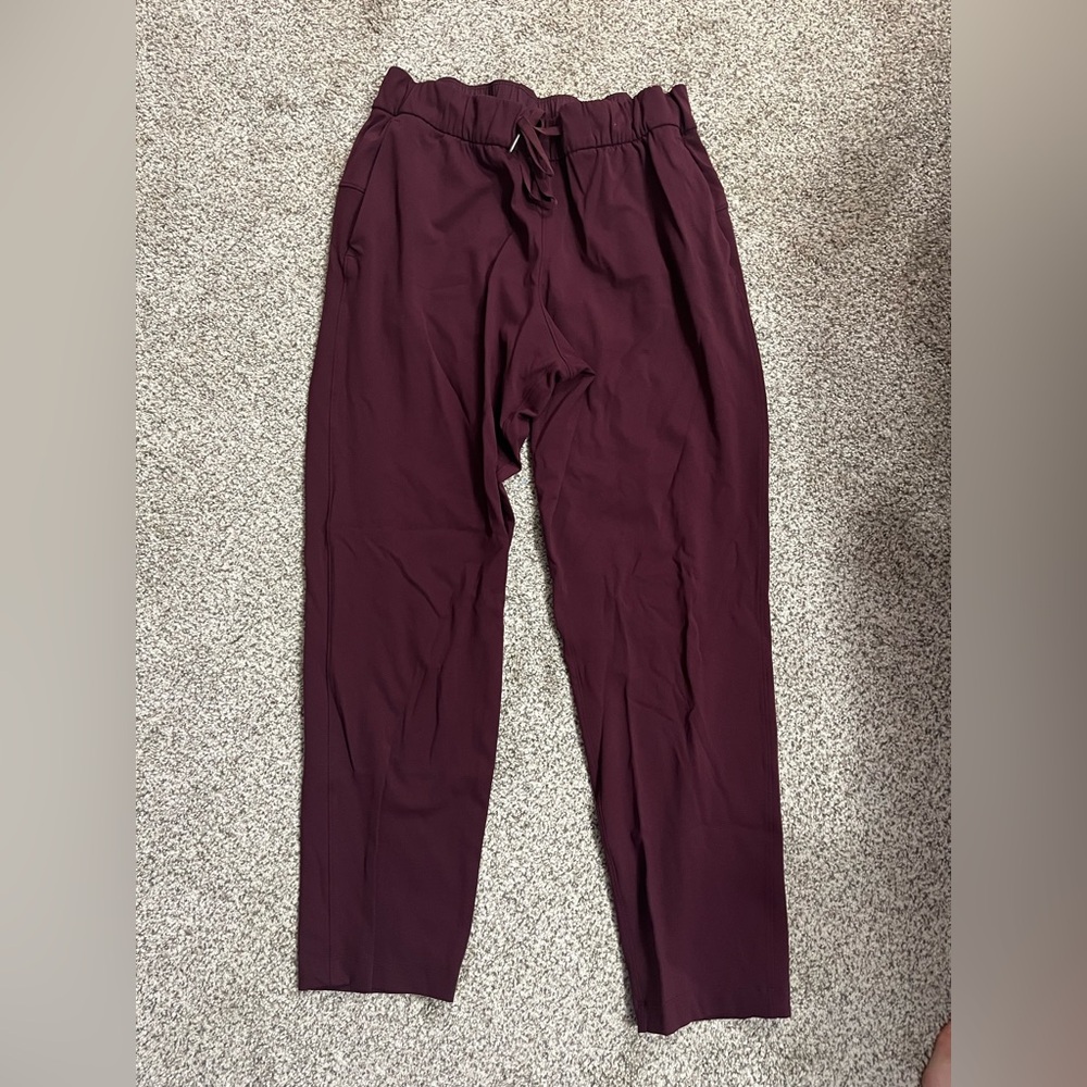 lululemon athletica On The Fly Women’s Maroon Pant 27”